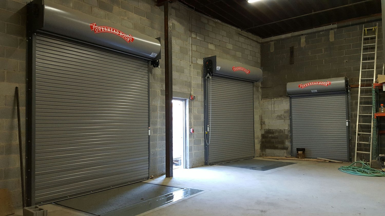 Extended Loading Dock Levelers & Tapered Dock Seals for Declining Driveways